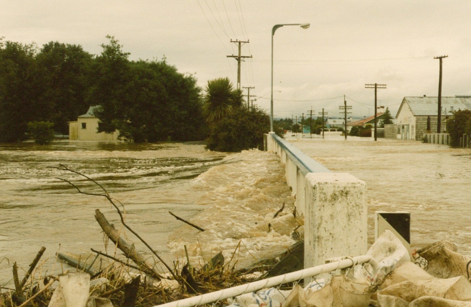 Otautau Stream Bridge, Main Street. Scout Den on left, 1984